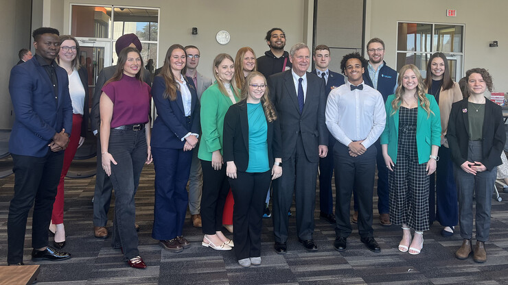 University of Nebraska students pose for a photo with U.S. Agriculture Secretary Tom Vilsack during his campus visit on March 28.