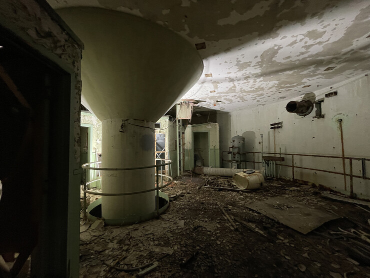 Ravaged by time, the missile silo is full of debris.