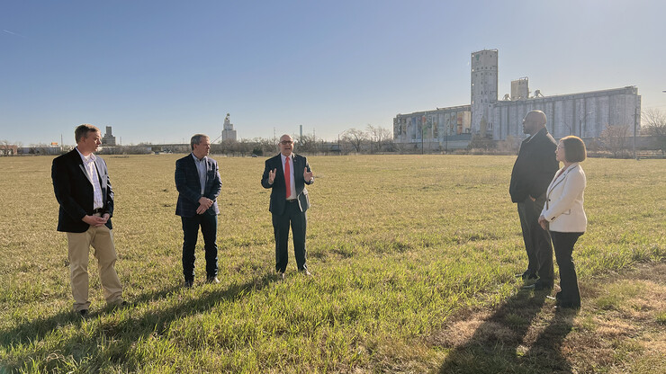 Mike Boehm (center), vice chancellor of the Institute of Agriculture and Natural Resources, outlines plans for the USDA facility on its future construction site at Nebraska Innovation Campus. Listening to Boehm’s presentation are (from left) Marty Schmer, USDA-ARS research agronomist; Gov. Jim Pillen; Chancellor Rodney D. Bennett; and Sherry Vinton, director of the Nebraska Department of Agriculture.