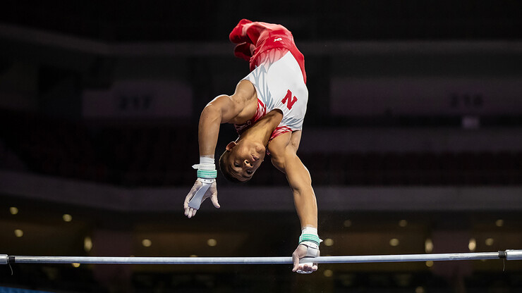 Samuel Phillips competes in a gymnastics competition
