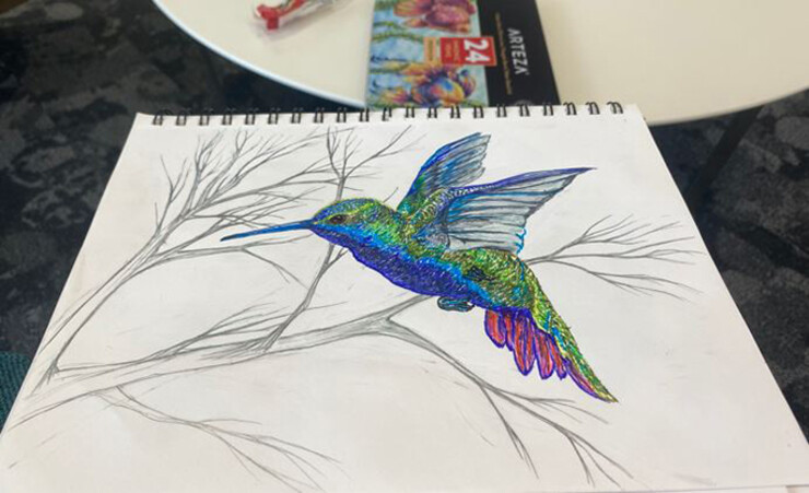 Drawing is among the hobbies that Elizabeth Neill pursues when she is not at work for Counseling and Psychological Services. Her work includes this hummingbird drawing.
