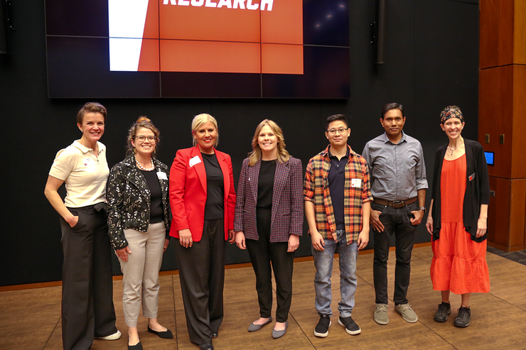 Valerie Jones (far left), associate professor of advertising and last year’s winner, co-hosted this year’s slam with Jocelyn Bosley (far right), research impact coordinator. Presenters were (from left) Gwendŵr Meredith, Ruth Woiwode, Ciara Ousley, Ryan Tan and Mohammad Hasan.