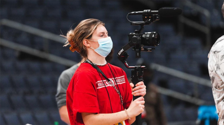 Nebraska's Sophia Stueven works the sidelines during the NCAA volleyball championships in Columbus, Ohio, on Dec. 16, 2021.