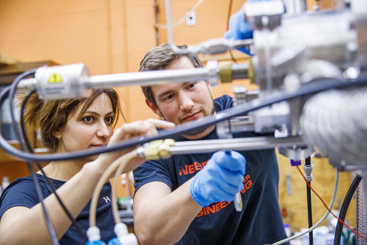 Graduate students Zahra Ahmadi and Mark Anderson work in the Scott Engineering Center in November 2019. Beyond developing students individually, the new Peter Kiewit Foundation Engineering Academy in the College of Engineering will increase access and enhance diversity by removing financial barriers to engineering education and encouraging and supporting more Nebraska women to pursue careers in engineering, computing and construction.