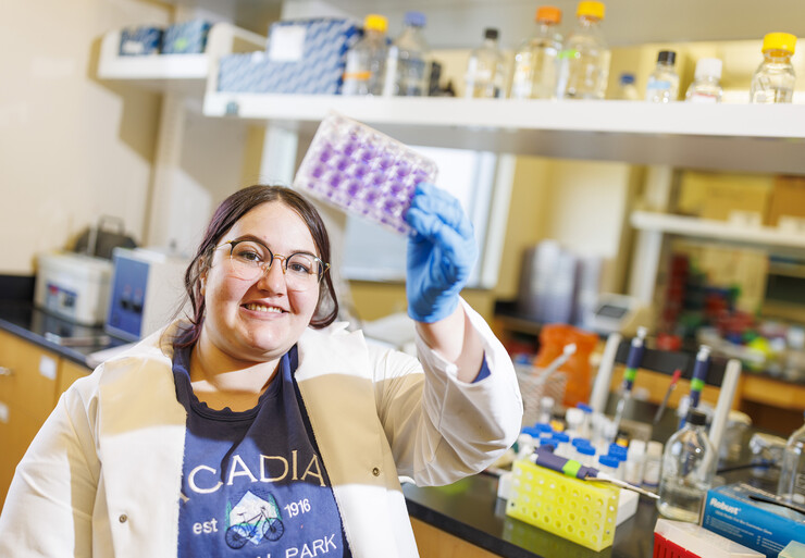 Sarah Altman checks a virus culture as she works in Shi-Hua Xiang’s lab in Morrison Hall. Altman, a junior majoring in biological systems engineering, has been awarded a Goldwater Scholarship.