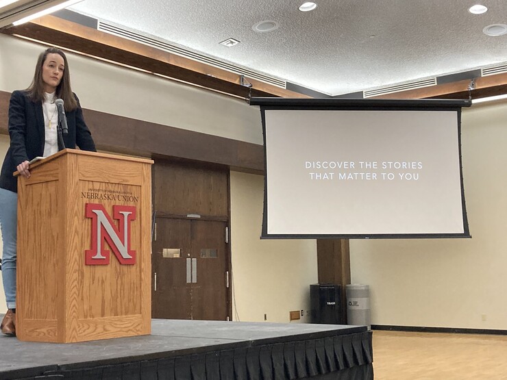 Alyssa Schukar, a Washington, D.C.-based photojournalist, educator and writer, delivers the keynote presentation during the Nebraska High School Press Association convention on Oct. 17.
