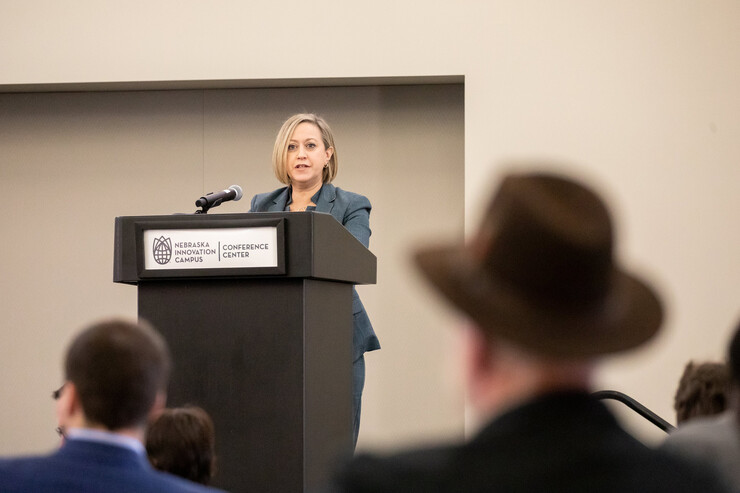 Andrea Durkin, assistant U.S. trade representative for the World Trade Organization and Multilateral Affairs, addresses the Yeutter Institute symposium at Nebraska Innovation Campus.