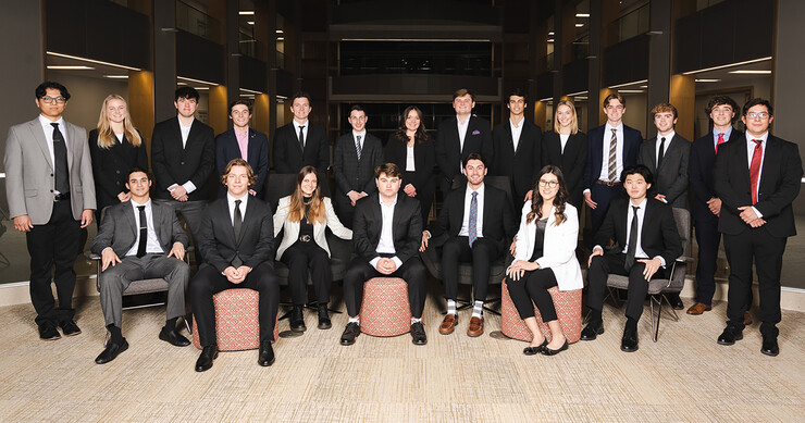 Twenty-one of the new Husker Venture Fund associates pose in Howard L. Hawks Hall.