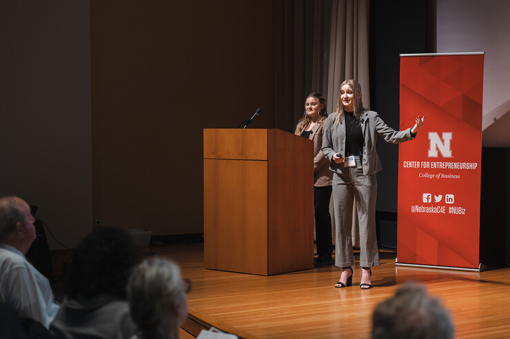 Grace Clausen and Bridget Peterkin, both senior computer science majors from Omaha, present their team's business, Dyslexico, during the 2023 New Venture Competition. Dyslexico is a spell-check and autocorrect solution optimized for people with dyslexia.