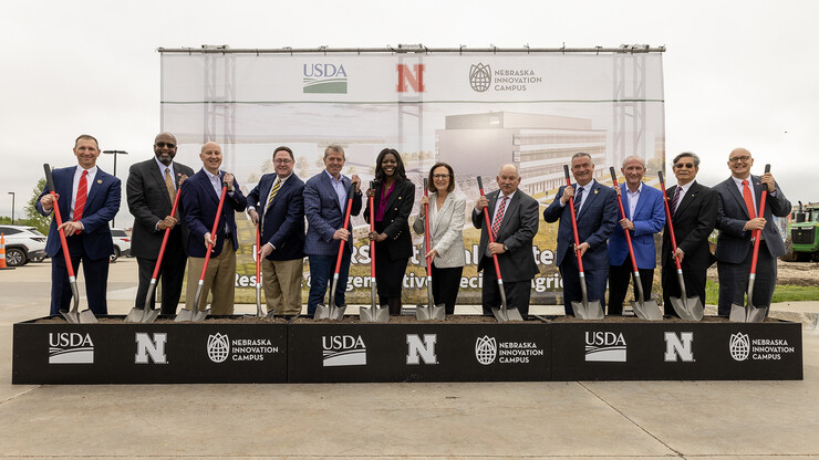 Federal, state and university leaders launched construction of the USDA's National Center for Resilient and Regenerative Precision Agriculture with a May 6 groundbreaking at Nebraska Innovation Campus. Pictured (from left) is Chris Kabourek, interim president of the University of Nebraska; Rodney D. Bennett, chancellor, University of Nebraska–Lincoln; U.S. Senator Pete Ricketts; U.S. Representative Mike Flood; Nebraska Governor Jim Pillen; Chavonda Jacobs-Young, under secretary for research, education and economics and chief scientist for the USDA; U.S. Senator Deb Fischer; Paul Kenney, University of Nebraska regent; U.S. Representative Don Bacon; Jack Stark, University of Nebraska regent; Simon Liu, USDA-ARS administrator; and Mike Boehem, vice chancellor for UNL’s Institute of Agriculture and Natural Resources.