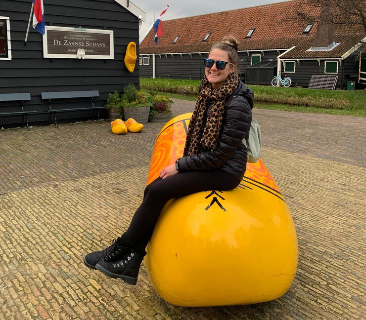 Jaylen Peters poses on an oversized wooden clog during a visit to the Netherlands. One of Peters' great loves is travel.
