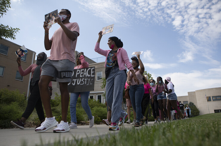 Members of the Black Student Union and the Lincoln community march during the Say Her Name Rally and Chalk Walk on July 3. The event was dedicated to Oluwatoyin Salau, a Black Lives Matter protester who was murdered in Florida, and other Black women who have been killed.