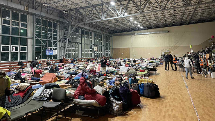 The refugee center in which Tatyana Gulchuk volunteered was a converted athletic facility. The space featured multiple cots to give the refugees a chance to rest before being transported to a more permanent assistance site.