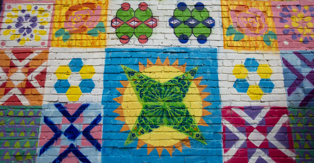 Detail of the mural students created in Lincoln's historic Havelock neighborhood on April 17. Each block is two-feet square.