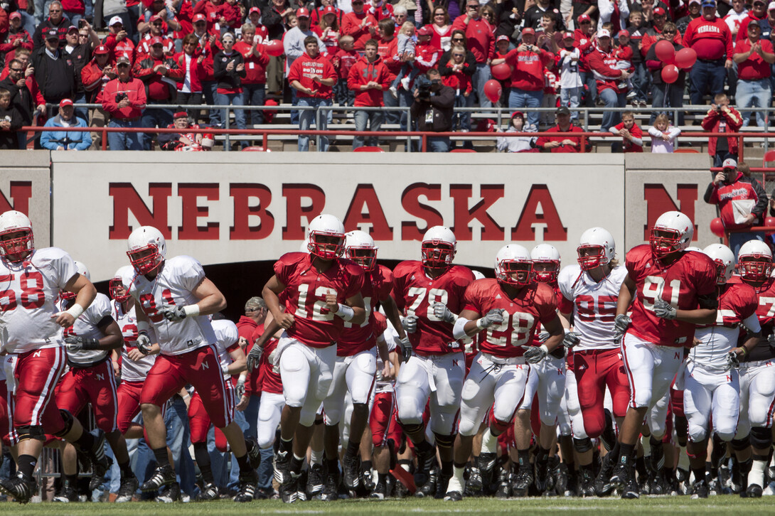 The Husker football team takes to the field for the 2011 Red-White Spring Game. The annual scrimmage is expected to draw more than 48,000 fans to Memorial Stadium on April 12.