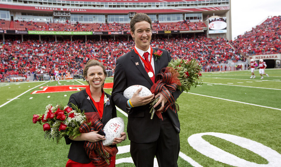 Seniors Jordyn Lechtenberg of Ainsworth (left) and Anders Olson of Tekamah were crowned king and queen of the 2013 UNL Homecoming celebration. Olson and Lechtenberg, elected in a vote of the UNL student body on Oct. 3, were crowned on the field at Memorial Stadium at halftime of the Nebraska-Illinois football game. 