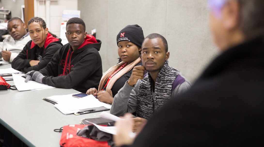 Students listen to UNL's Linda Moody describe the Alternative Spring Break to Alabama the students will be going on in Februray.