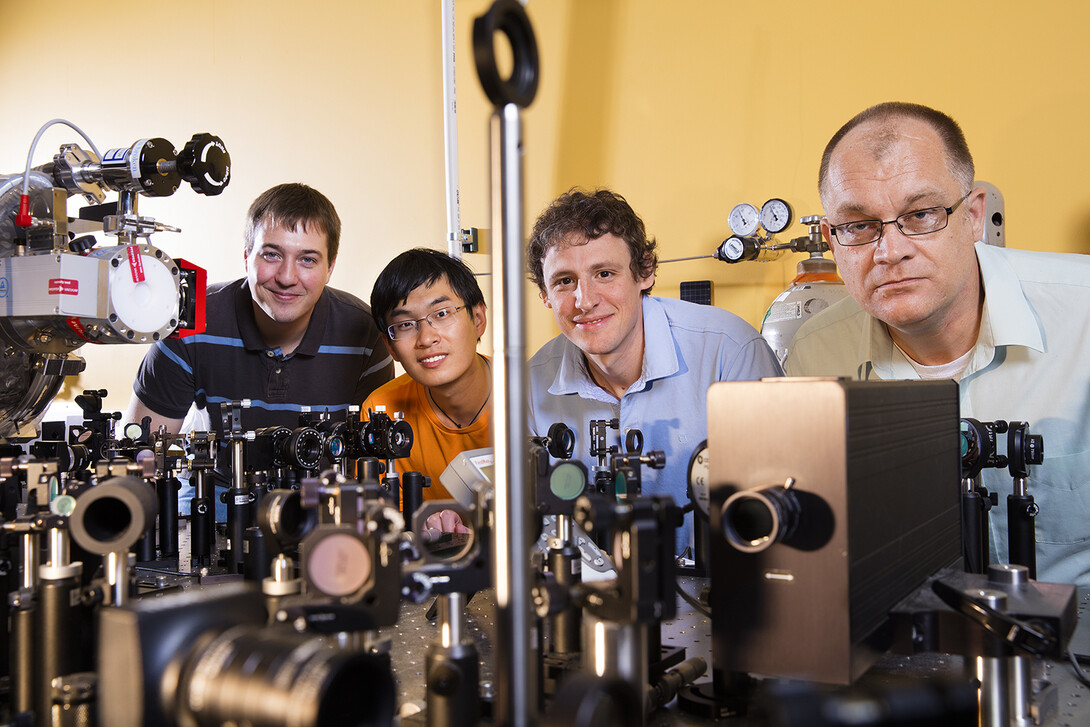 From left, doctoral students Joshua Beck and Jie Yang with Martin Centurion and Cornelis "Kees" Uiterwaal, associate professors of physics and astronomy.