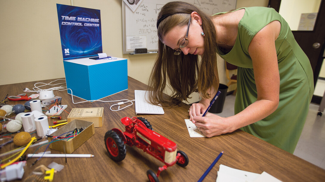 Jenny Thoegersen works on a puzzle in the C.Y. Thompson escape room on Aug. 28. The escape room, which will be open Aug. 30, was designed by Thoegersen and Erica DeFrain, both faculty in the University Libraries.