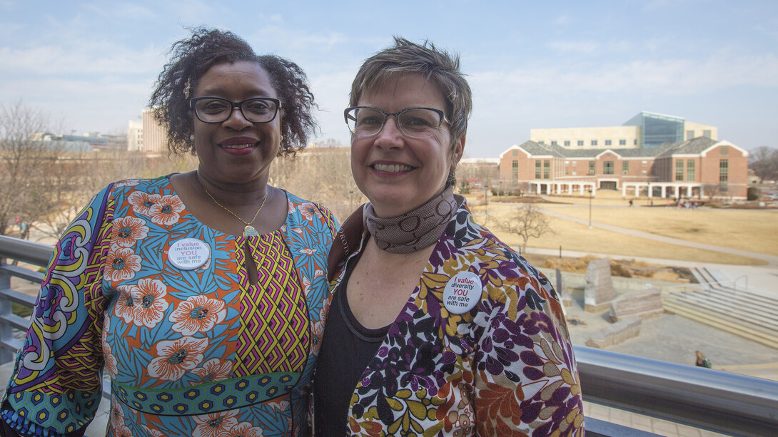 Nebraska's Karen Kassebaum (left) and Cindy Miesbach teamed up to create new diversity and inclusion buttons for staff employees.