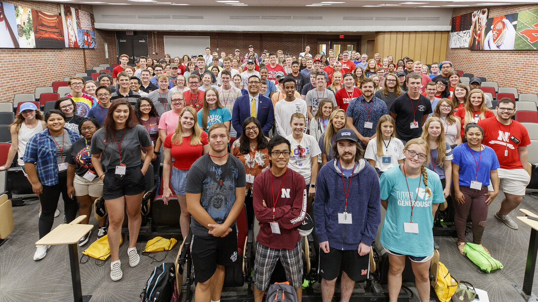 Omaha's Tony Vargas poses with the 163 students taking part in Nebraska's First Huskers program. Vargas also met with a handful of student leaders and toured the Adele Hall Learning Commons in Love Library North.