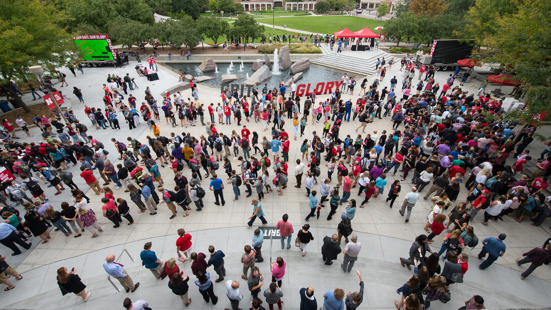 Students, faculty and staff gather on the Nebraska Union Plaza in celebration of the university's new "In Our Grit, Our Glory" celebration.