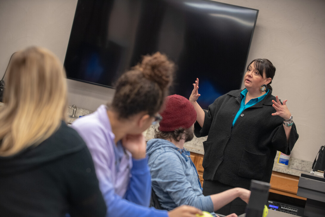 Colette Yellow Robe teaching a class