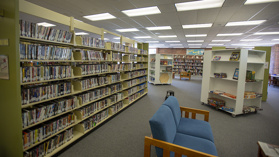 Other popular Media Services items — including movies (left) and board games are available for checkout in the second floor link of Love Library. The area also features the library's graphic novel collection.