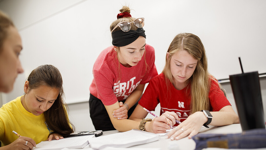 In this 2019 file photo, students work in groups during a Calculus class.