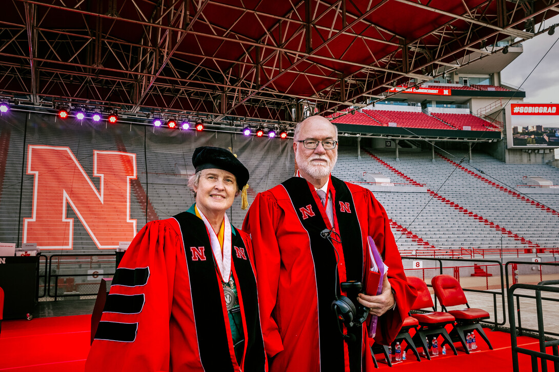 Dr. Bob and Dr. Vanessa Gorman at the 2024 undergraduate commencement in Memorial Stadium. 