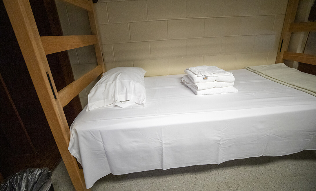 A bed is shown in a residence hall on the University of Nebraska–Lincoln campus.