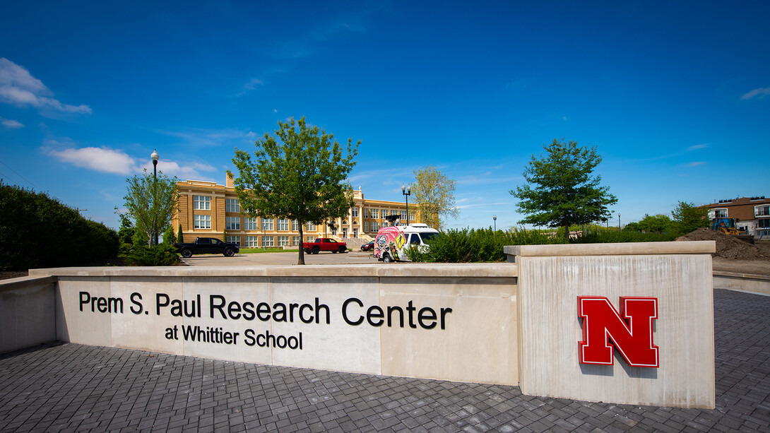 A new sign on the Vine Street side of the Whittier Building honors the legacy of Prem Paul and caps the renaming of the building.