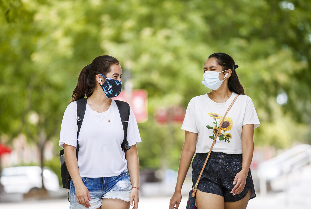 Anamaría Guzmán Cárdenas and Shridula Hegde walk through city campus Aug. 4, 2020. Despite the difficulties caused by COVID-19, the pandemic also led Cárdenas to discover she could combine her two loves — science and dance — in a future career.