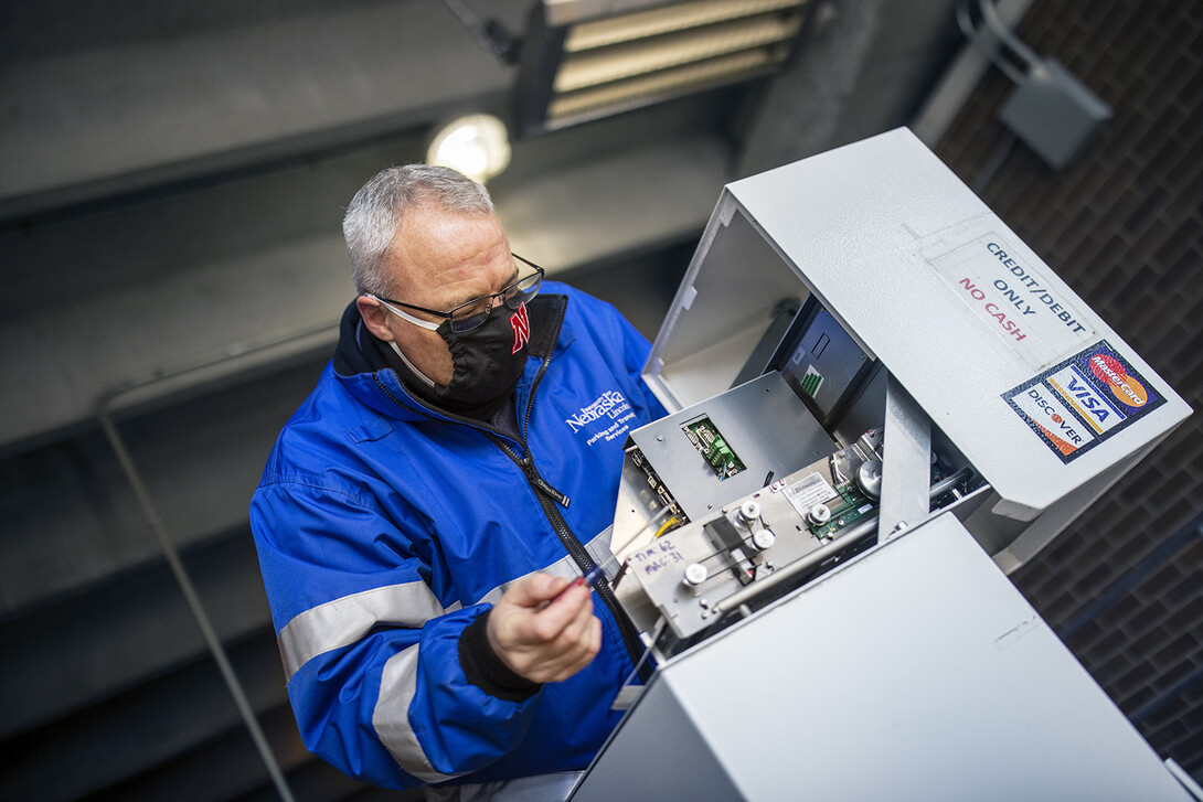 Kirk McManus, a retired Air Force veteran, repairs the various machinery within the university's five parking garages. Knowledge earned in the Air Force allowed him to transition seamlessly to his technician role on campus.