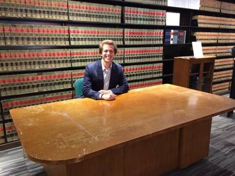 College of Law student Daniel Gutman of Omaha sits at the desk once used by Thurgood Marshall, the founder of the NAACP Legal Defense and Educational Fund and the first African-American U.S. Supreme Court Justice. Gutman is participating in a legal internship at LDF in New York made possible through a fellowship he received from the Nebraska Public Interest Law Fund.