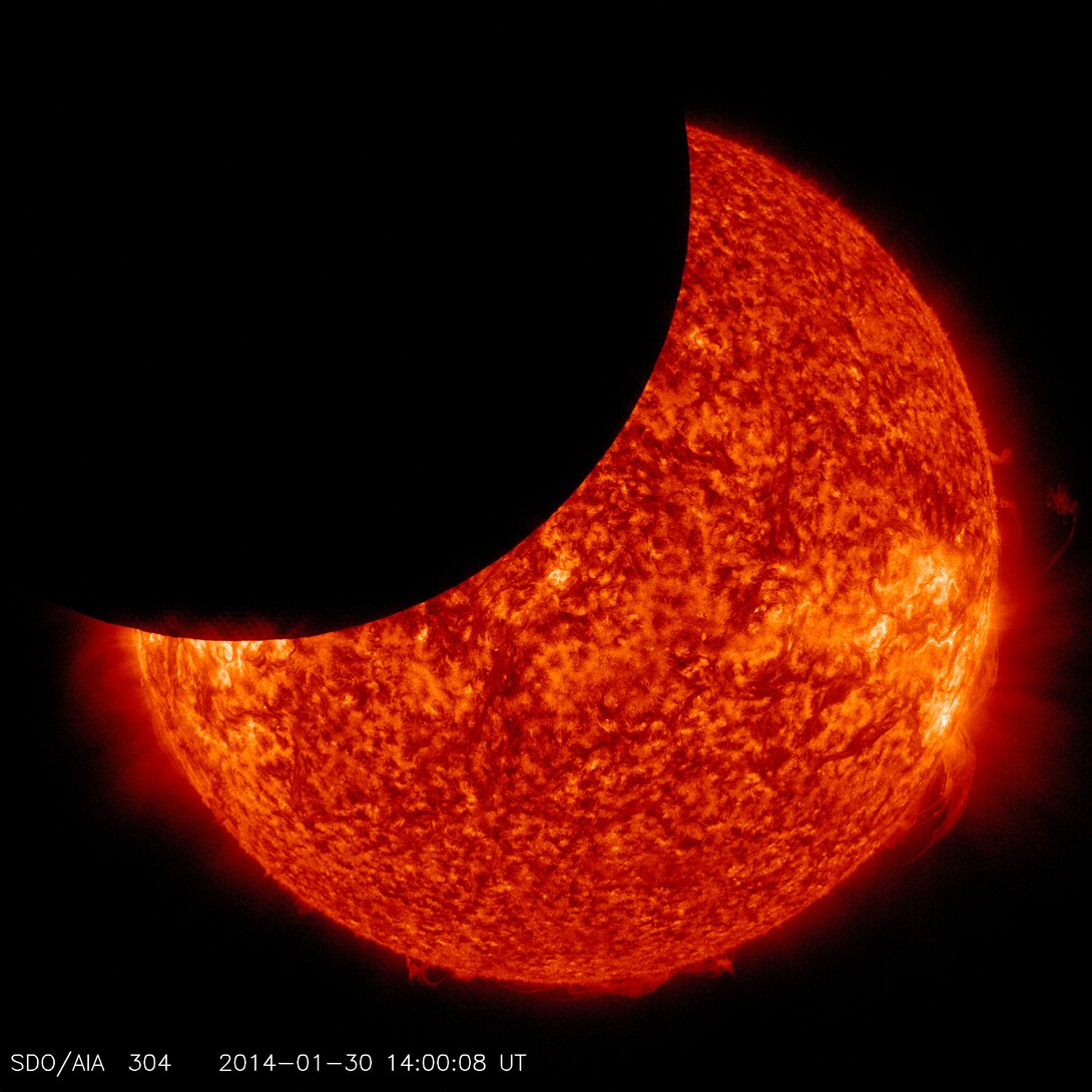 Color image of the Jan. 30, 2014, partial solar eclipse captured by NASA's Solar Dynamics Observatory.