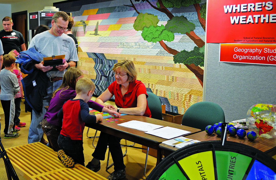 Milda Vaitkus, project manager in UNL's School of Natural Resources, runs the "Where's the Weather" booth during the 2014 Weatherfest. The 16th annual Weatherfest will take place from 9 a.m. to 2 p.m. and the Central Plains Severe Weather Symposium will run from 1 to 4 p.m. April 16 at Hardin Hall, 3310 Holdrege St. 