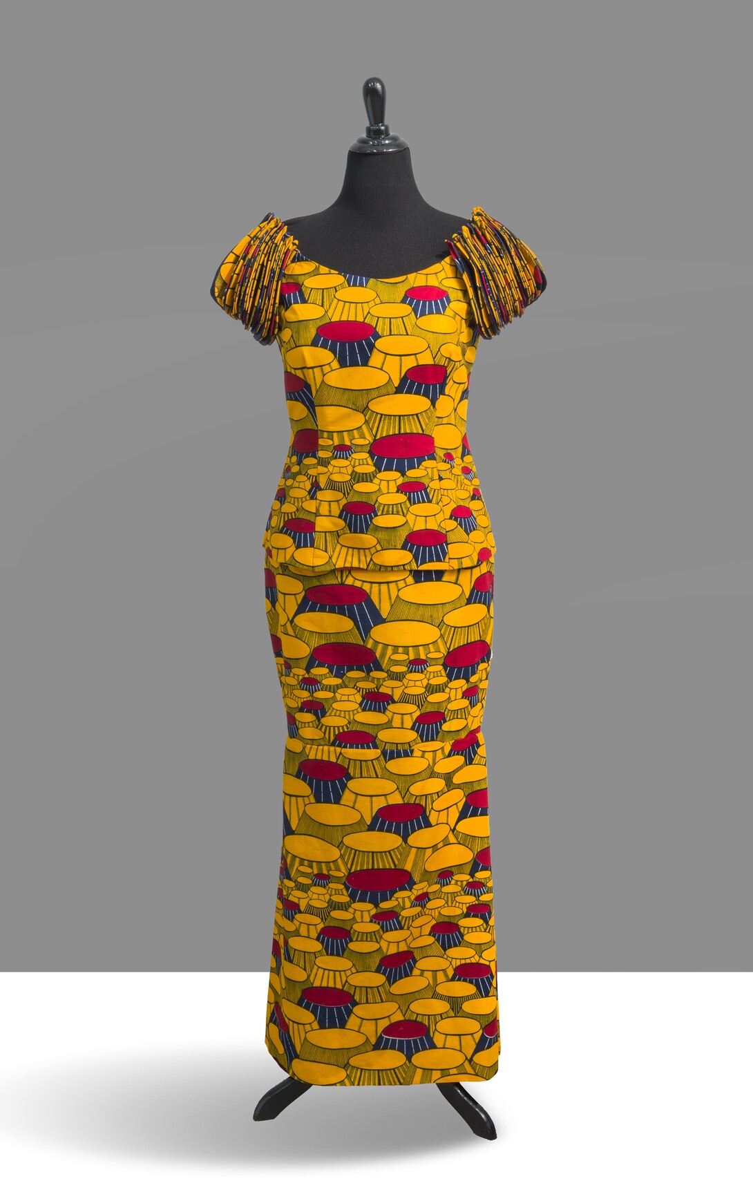 King's Chair Dress Form, introduced in 1980, manufactured by Vlisco, Netherlands; Dutch Wax Block on cotton, 48 x 12 inches.