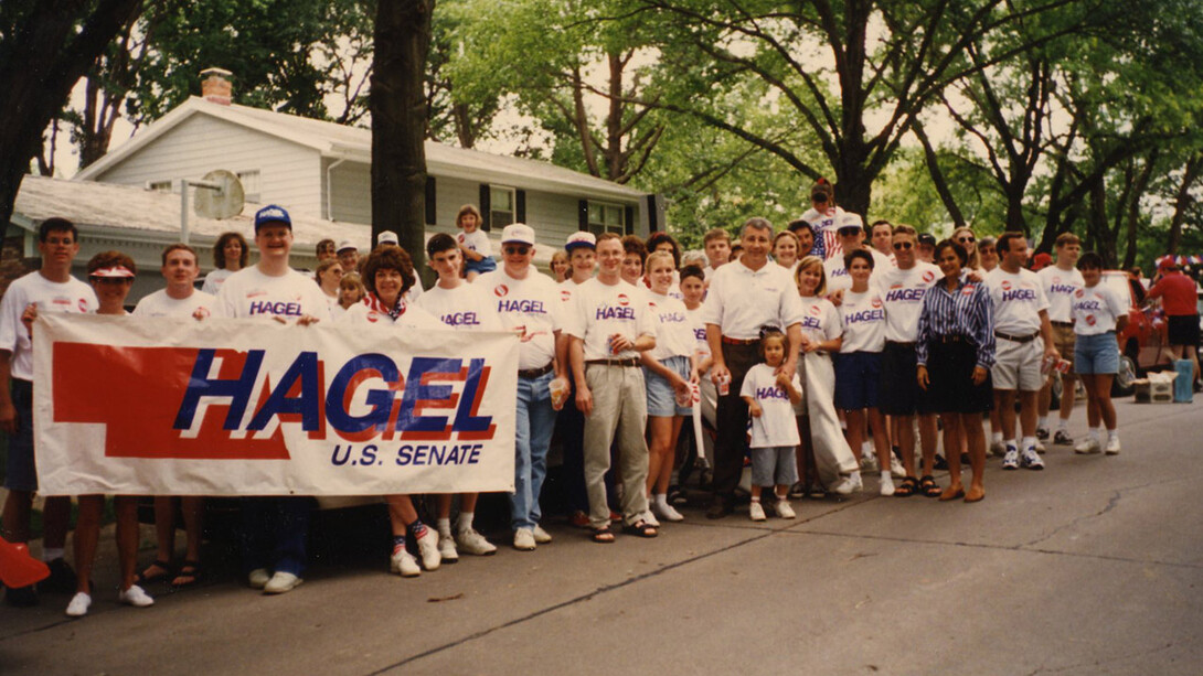 Chuck and Lilibet Hagel pose with Fourth of July parade participants in Ralston in 1996.