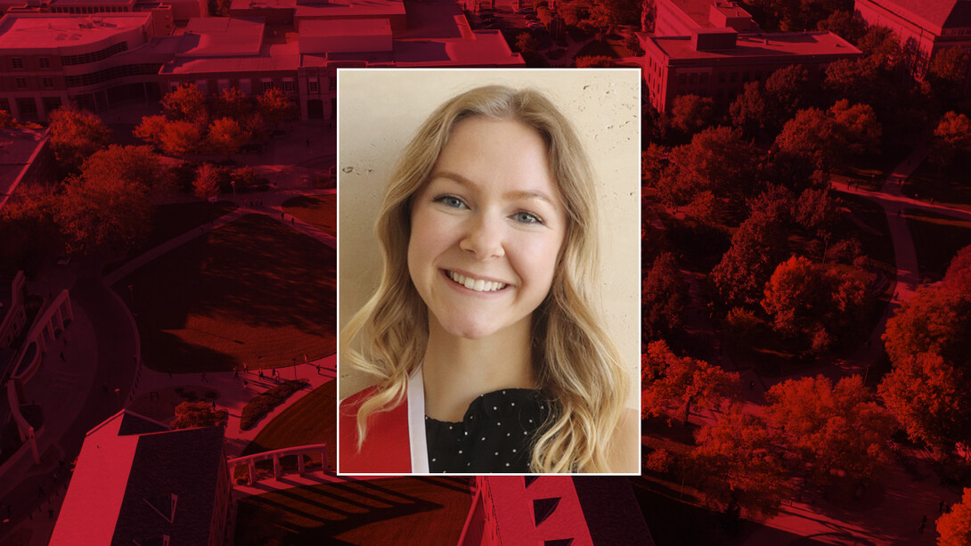 Color portrait of McKenzie Nelson on red campus background