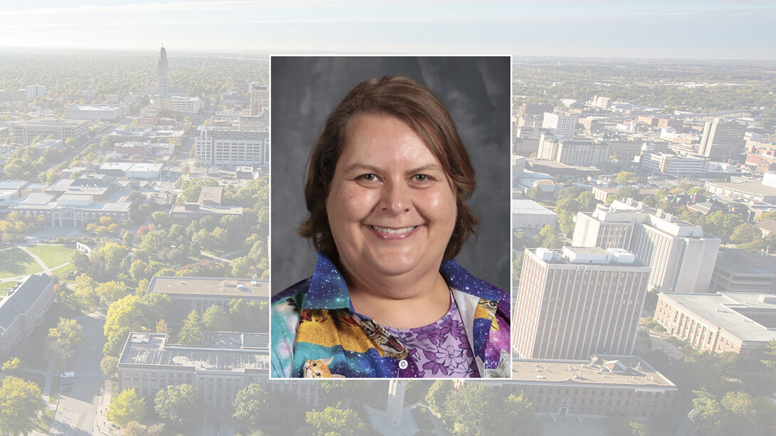 Color photo of Diane Biere on campus background