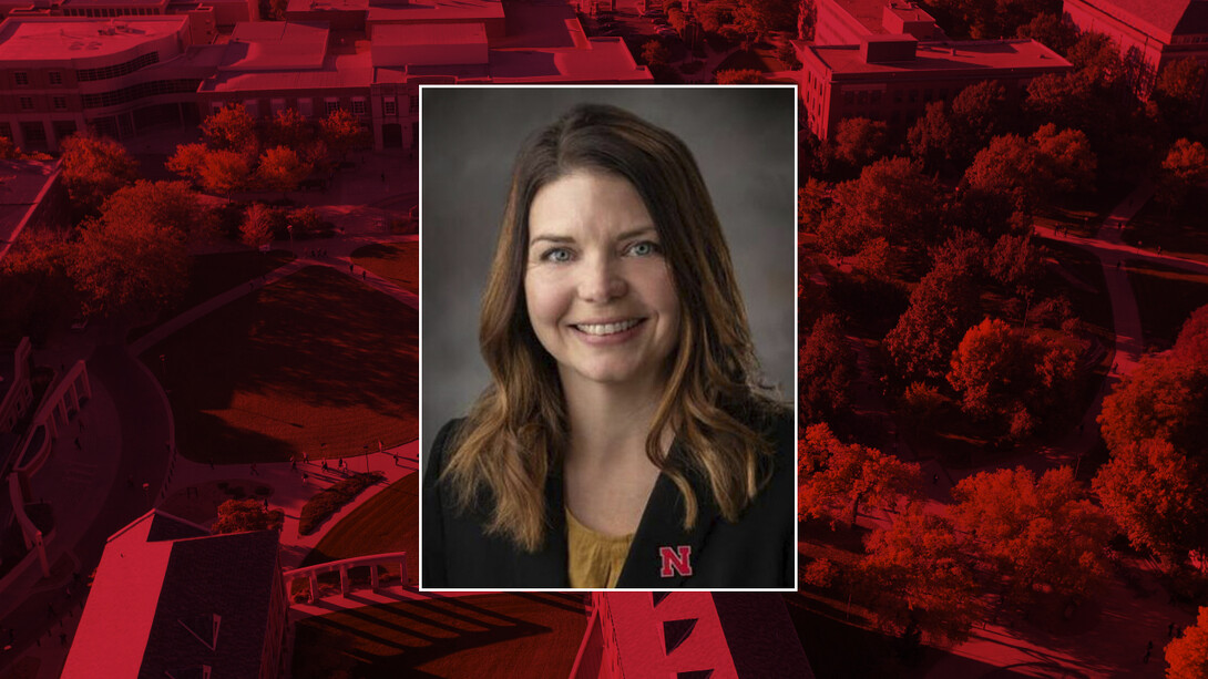 Color portrait of Dr. Lindsay Waechter-Mead on a red campus background.