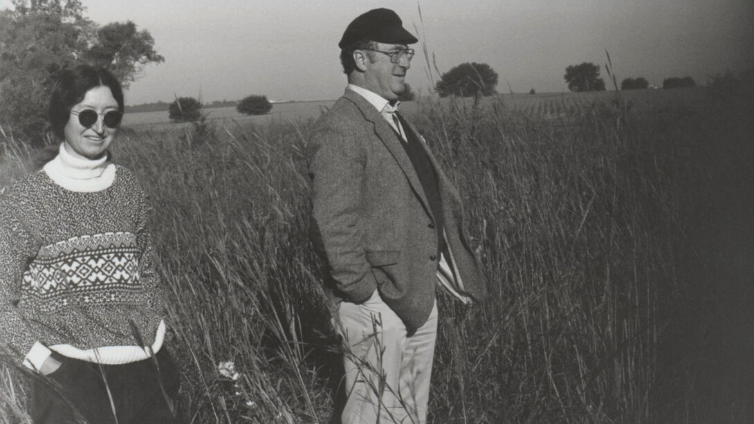 Fran Kaye, professor of English, stands next to Jim McCrorie, then director of the Great Plains Research Centre at the University of Regina, in a tallgrass prairie.