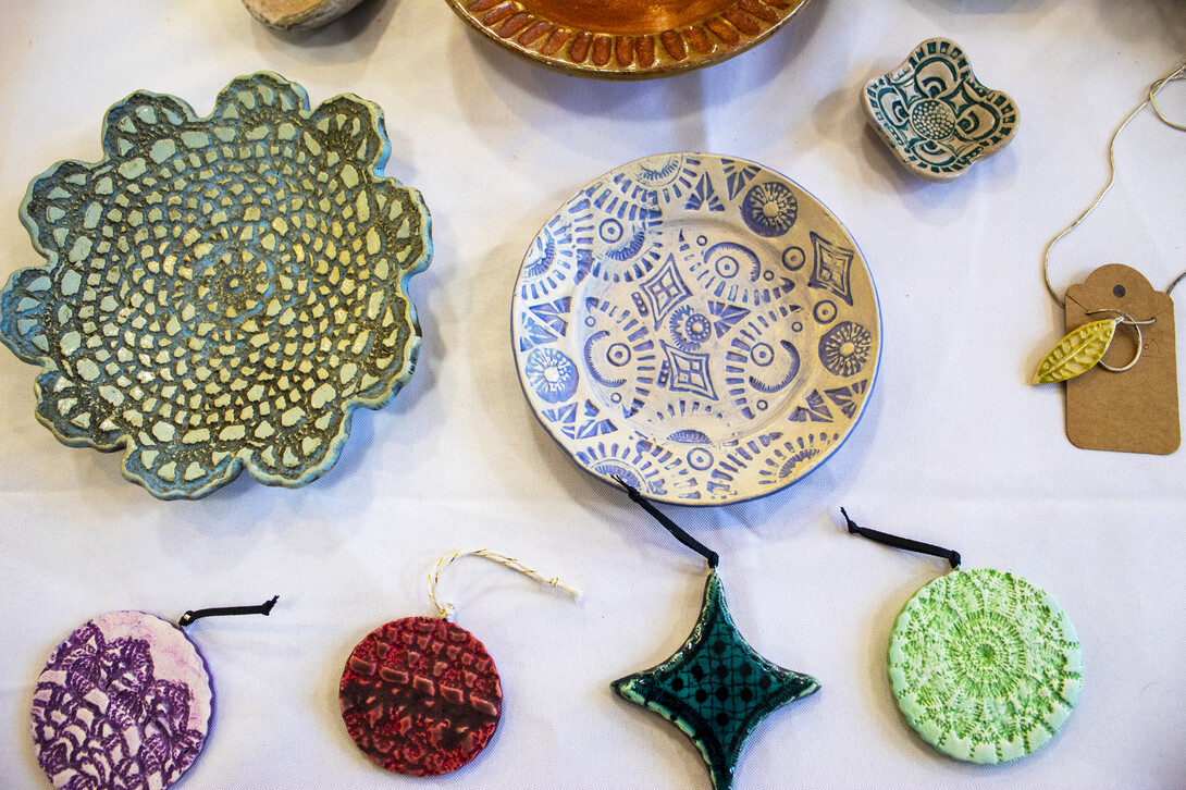Handmade earrings and trays by Angela Kent.