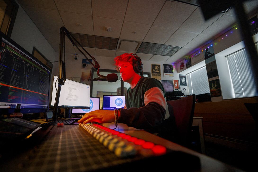 Ryan Luetkemeyer, a sophomore from St. Louis, does the afternoon broadcast from the booth at KRNU. November 9, 2022. 
