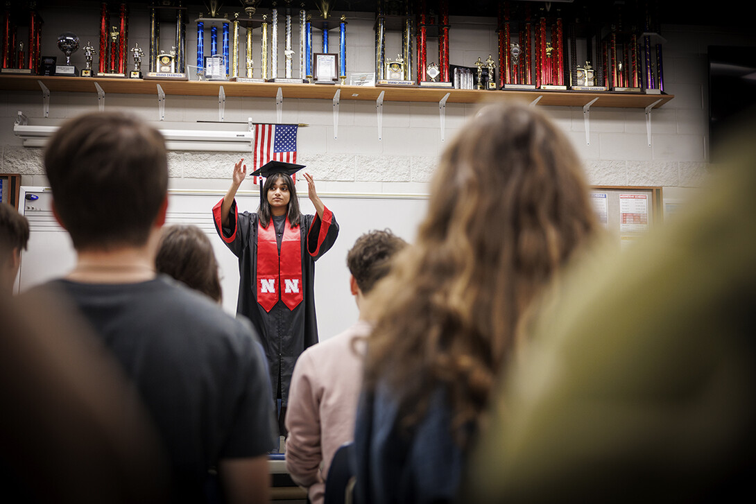 Ananya Amarnath conducts the Papillion-La Vista South choir as they prepare for their spring performances.