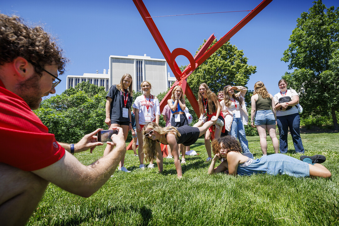Jameson Margetts takes a photo of his NSE group as they strike a goofy pose as part of the daily photo contest.