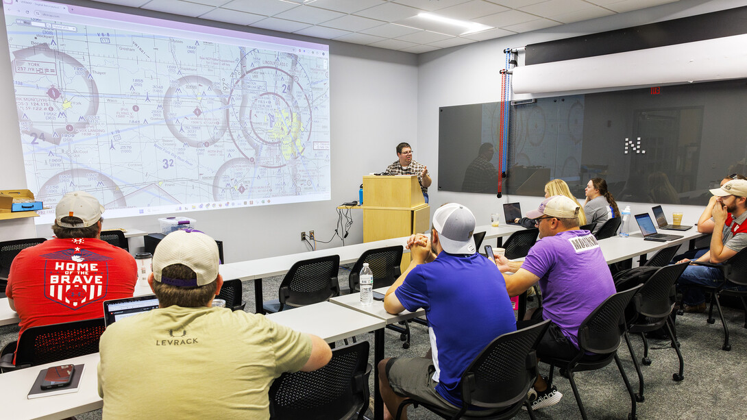 Travis Ray dissects aeronautical sectional charts so the future drone pilots can learn where they can and can’t fly. Ray, from Nebraska Innovation Studios is teaching drone classes so people can get their p107 license to fly.