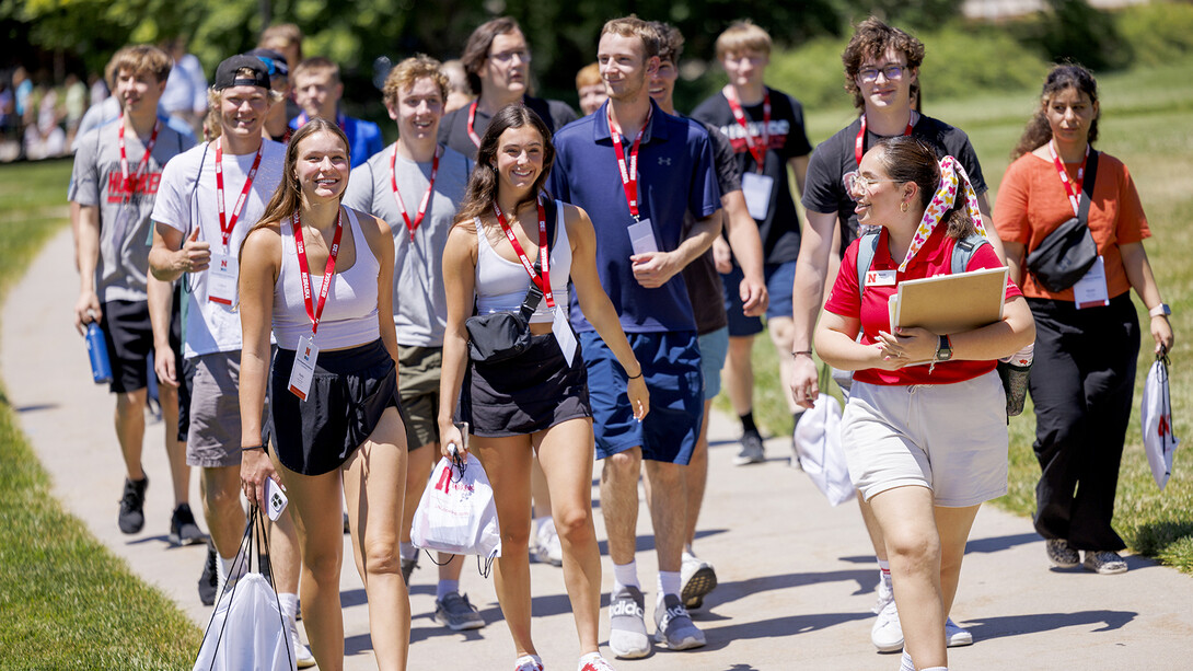 Students walk across campus during a New Student Enrollment day. For summer 2025, NSE participants will have a chance to have Runza for lunch.