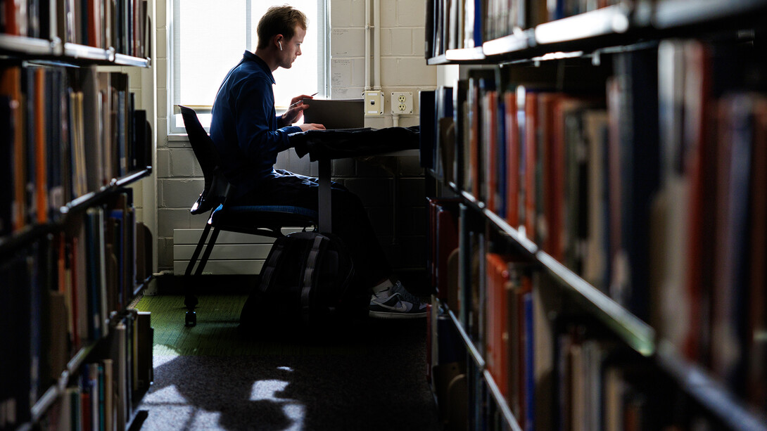 Camden Hjermstad, a freshman mechanical engineering major from Lincoln, studies in Love Library on Dec. 2.